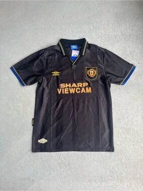Umbro Black Soccer Jersey with Gold Accents